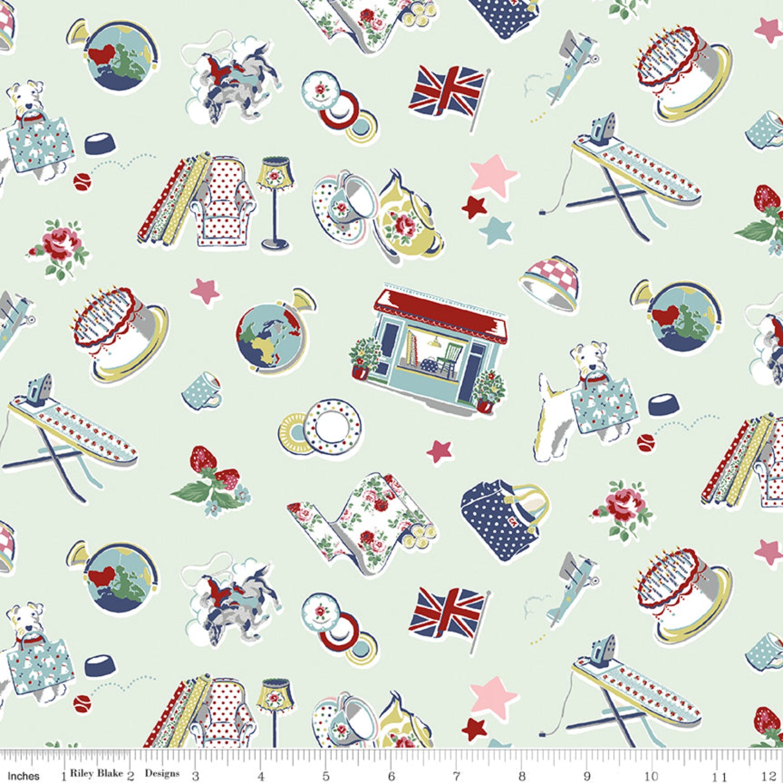A repeating fabric pattern featuring vintage-style illustrations of tea-time and dressing-room items, including an ironing board, teapot, cups, hats, roses, Union Jack flags, globes, and small buildings, on a pale mint green background. A ruler at the bottom shows scale.