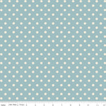 Fabric with small white polka dots on a light blue background