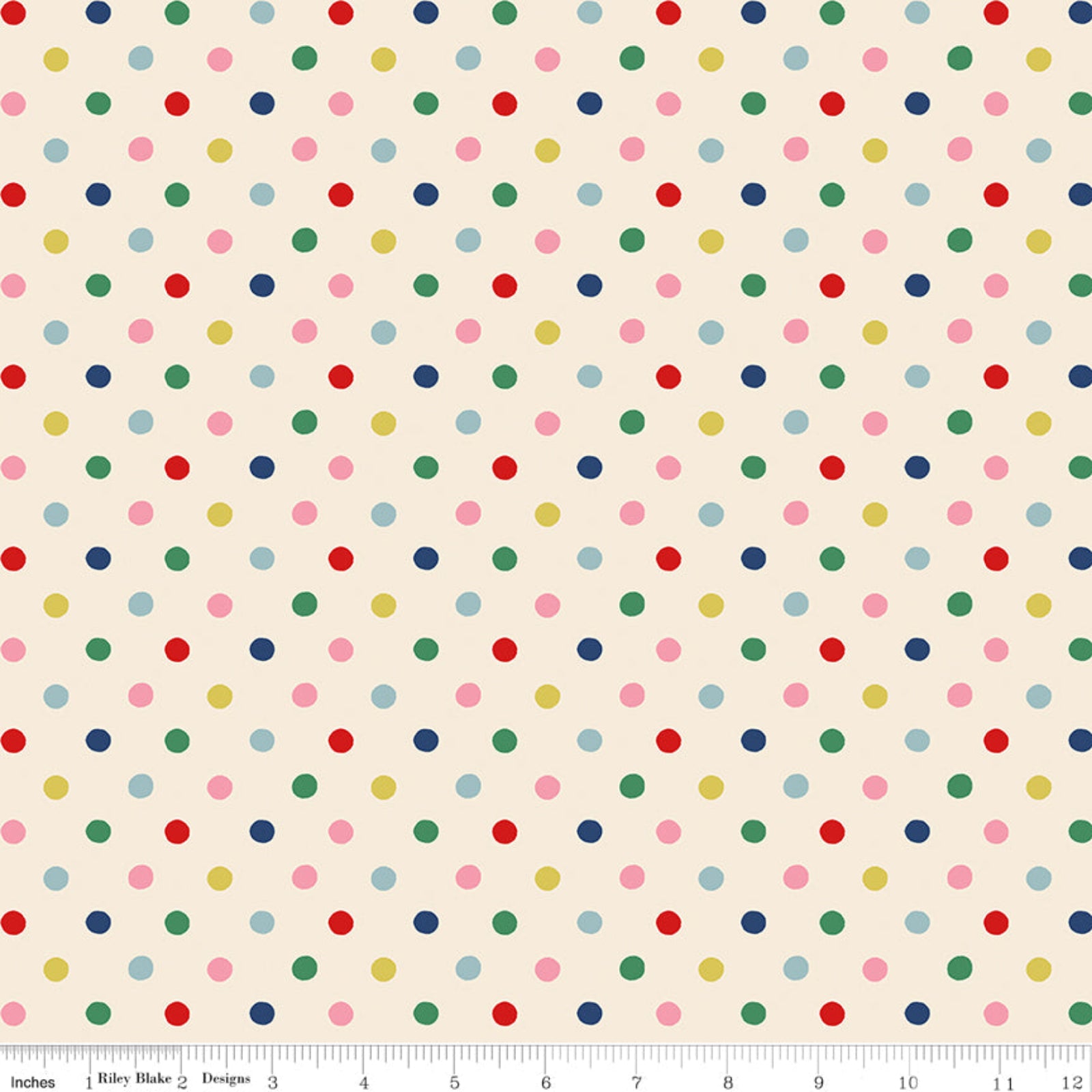 A repeating multicolor polka dot pattern on a warm cream background, with a ruler along the bottom edge showing inch measurements.
