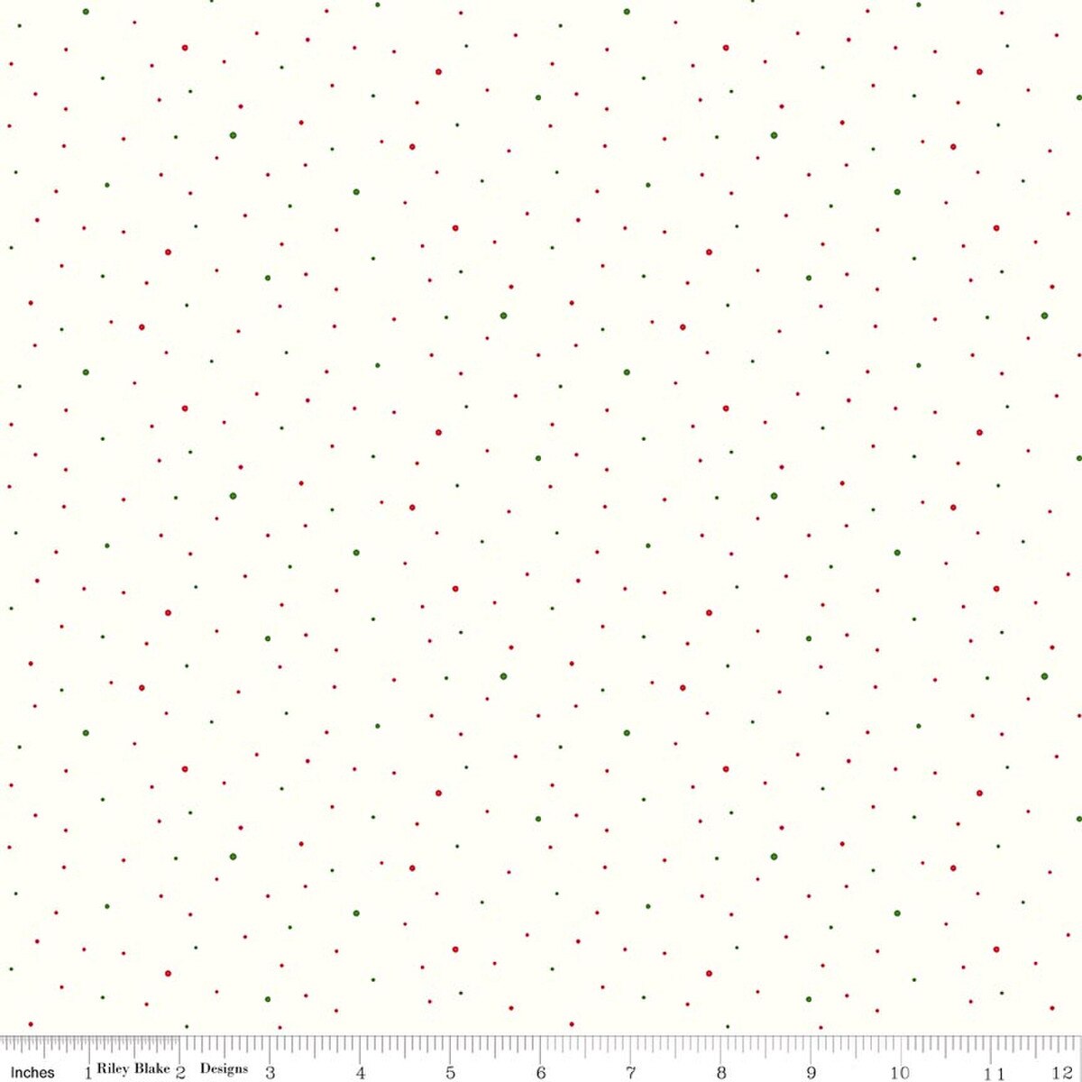 A repeating pattern of tiny red and green dots on an off-white background, with a measuring ruler along the bottom edge showing scale.