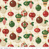 Pattern of Christmas ornaments on a fabric swatch with a ruler at the bottom.