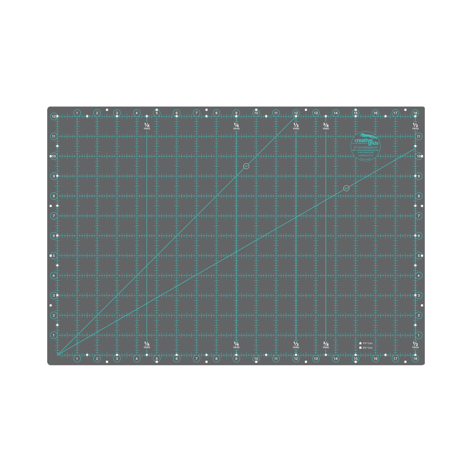 A dark gray acrylic cutting mat with a teal grid system, measurement markings, and a diagonal cutting guide, shown on a plain white background.
