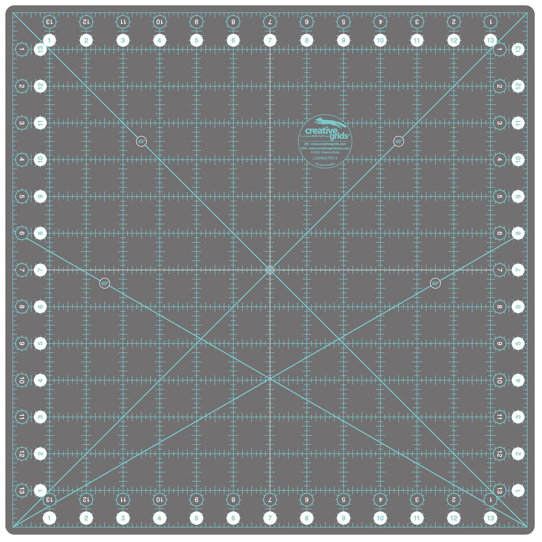 A square gray quilting ruler mat with a light blue grid, measurement markings, and a central circular logo for Creativity Glide.