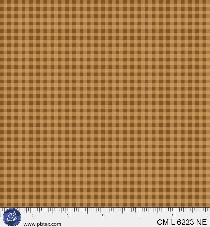 brown fabric texture with a ruler at the bottom for scale.