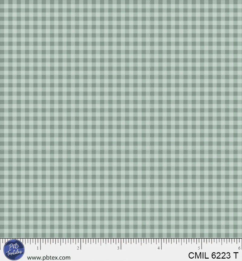 Light blue fabric texture with a ruler at the bottom for scale.