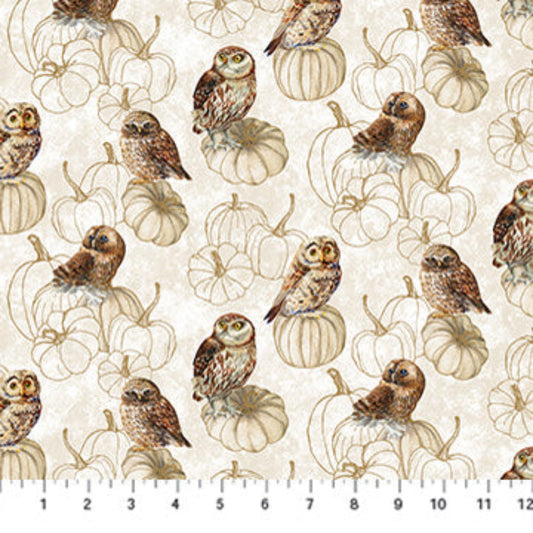 Fabric with owls and pumpkins pattern on a beige background