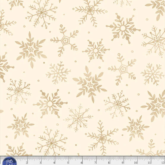 Pattern of gold snowflakes on a beige background.