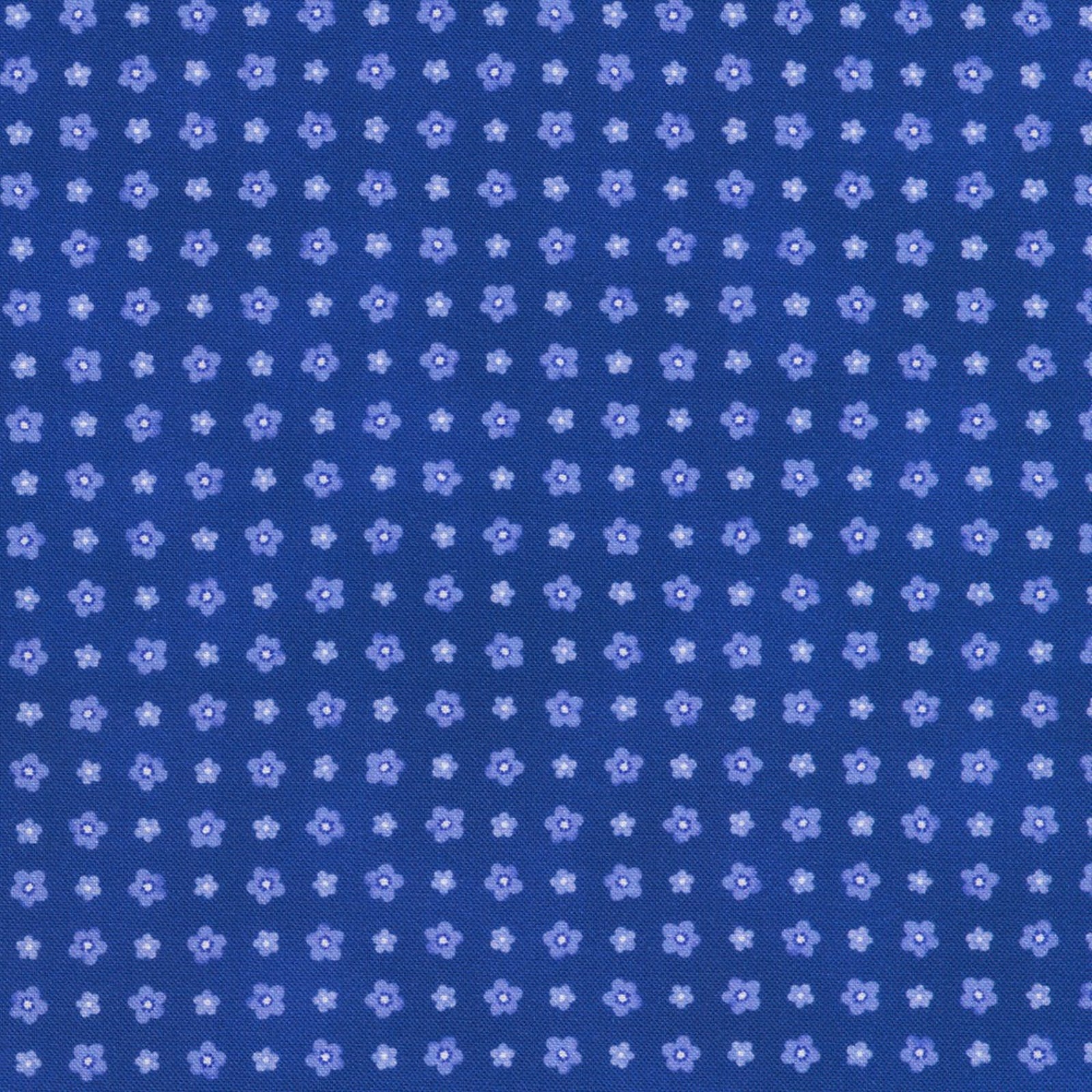 Blue fabric with small white floral pattern