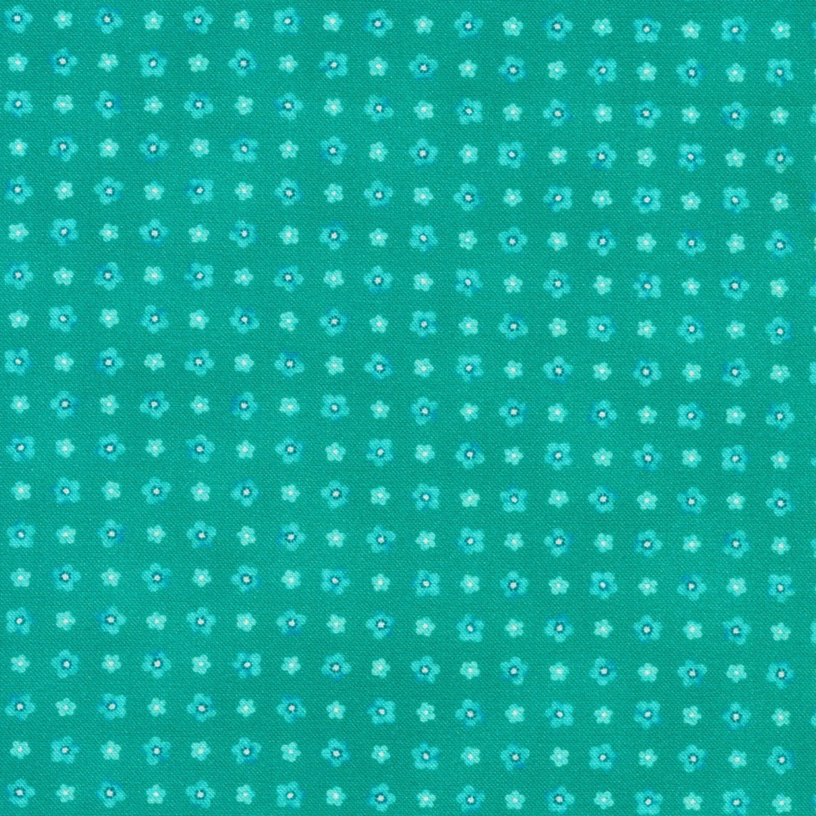 A close-up of a teal fabric with a repeating pattern of small light blue and white flowers with dark blue centers.