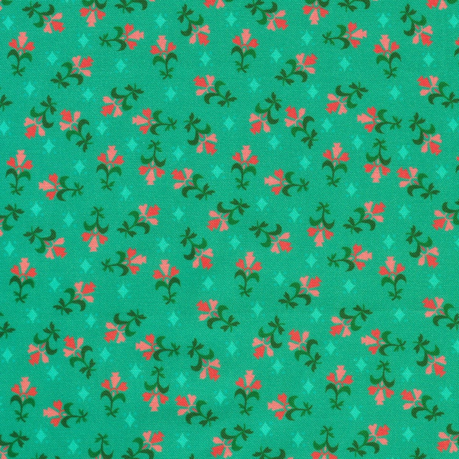 A close-up of a fabric pattern featuring small coral-pink flowers with dark green stems on a bright teal-green background, with a subtle repeating diamond motif.