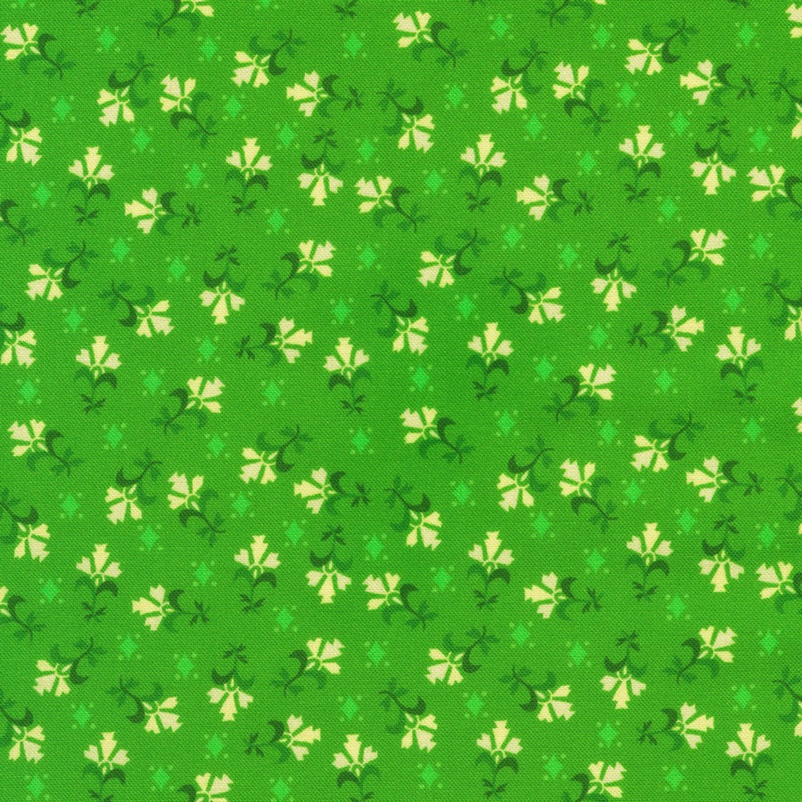 Green fabric with small light green floral pattern