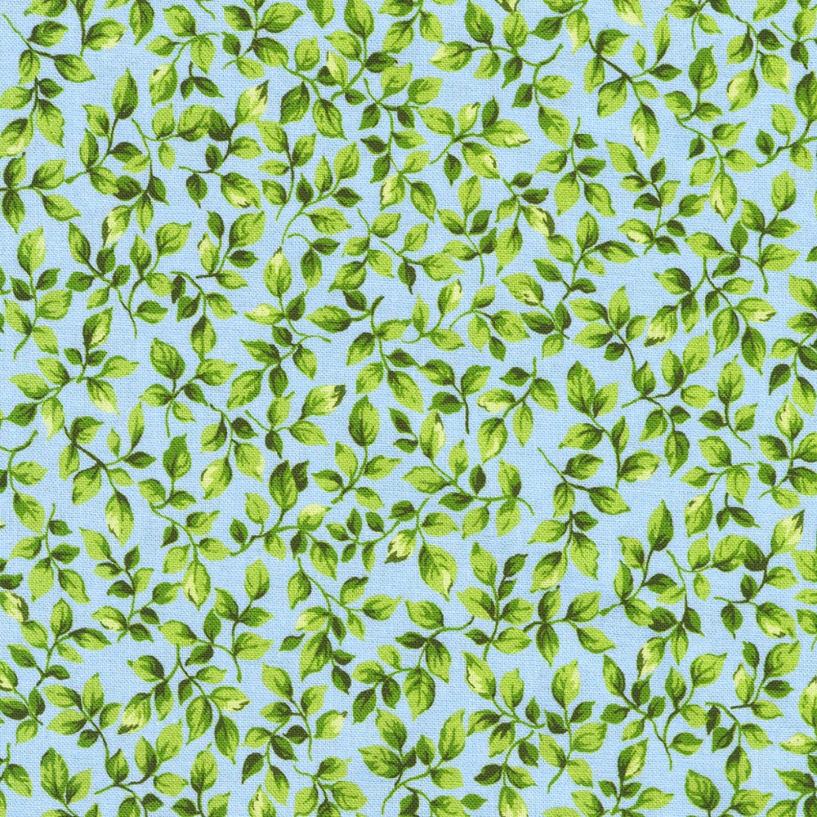 Pattern of green leaves on a blue background