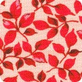 Red leaf pattern on a light red background