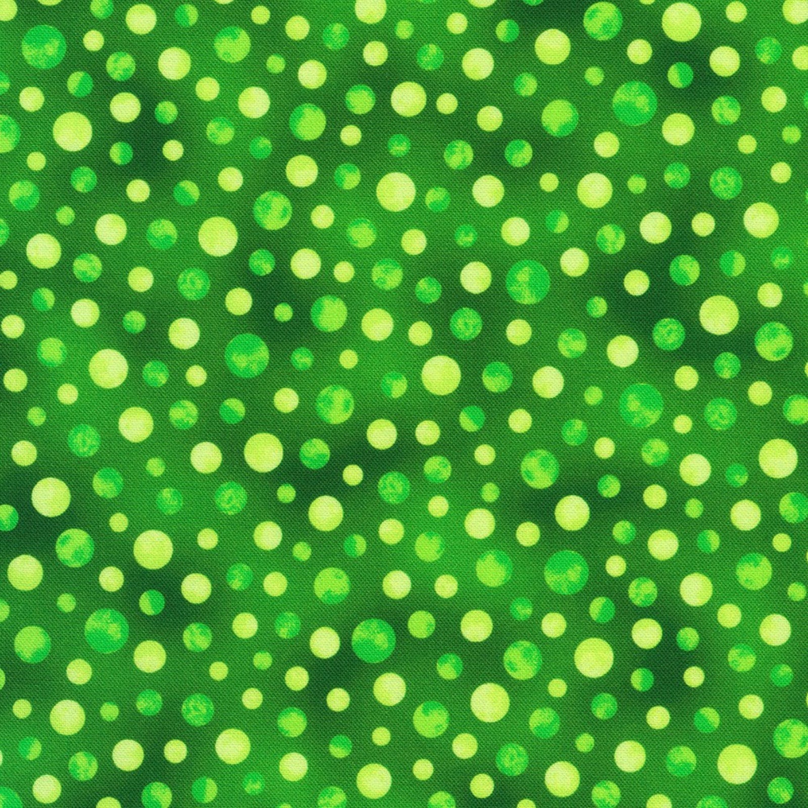 A repeating pattern of green and yellow-green polka dots of varying sizes on a textured green background.