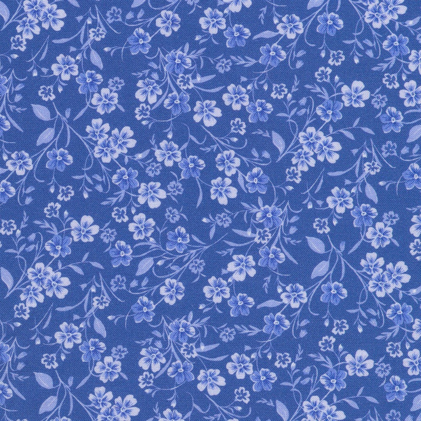 Floral pattern with small blue flowers on a blue background