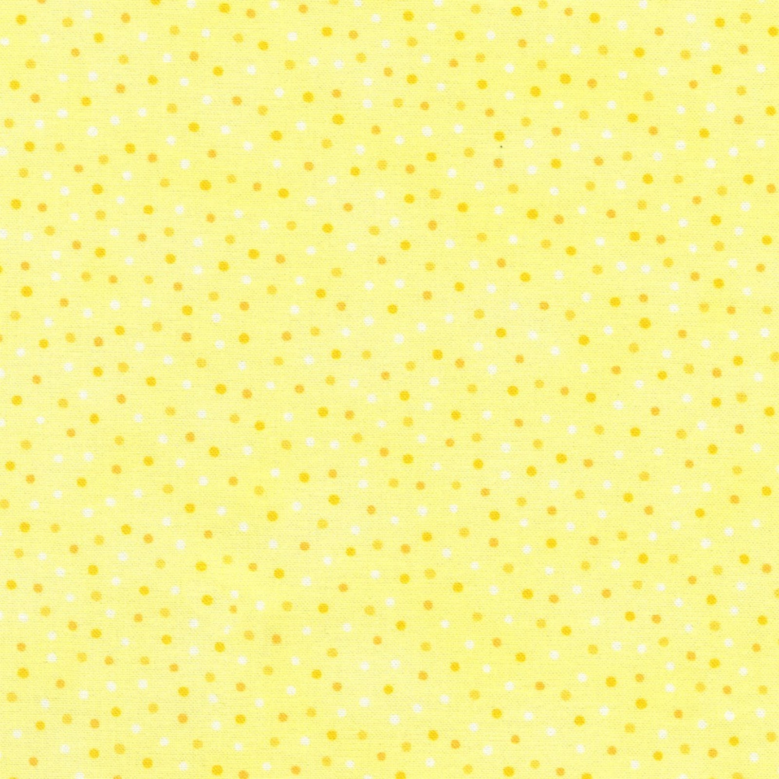 A close-up of a yellow fabric or material swatch with a repeating pattern of small white and yellow dots.