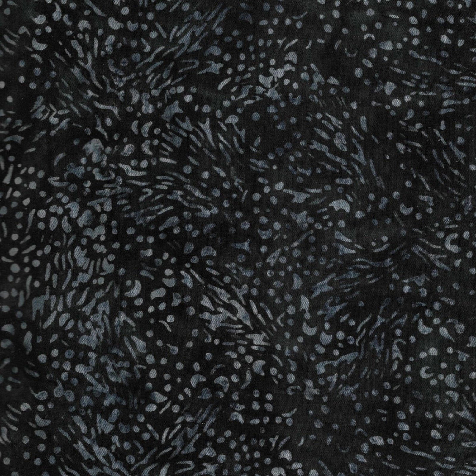 Black batik fabric with a blue-gray abstract spotted pattern.