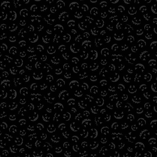 Black background with small jack o' lantern faces