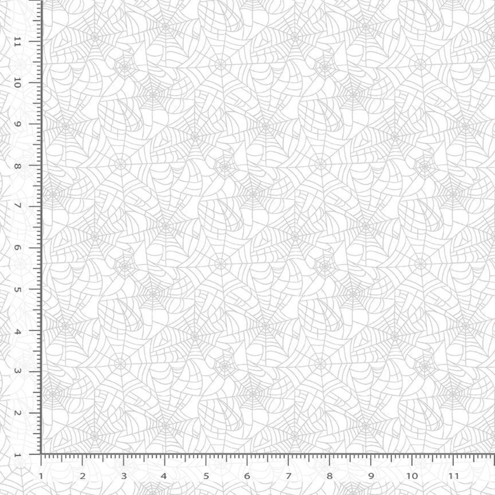 Pattern of spider webs on a white background with a ruler on the left side.