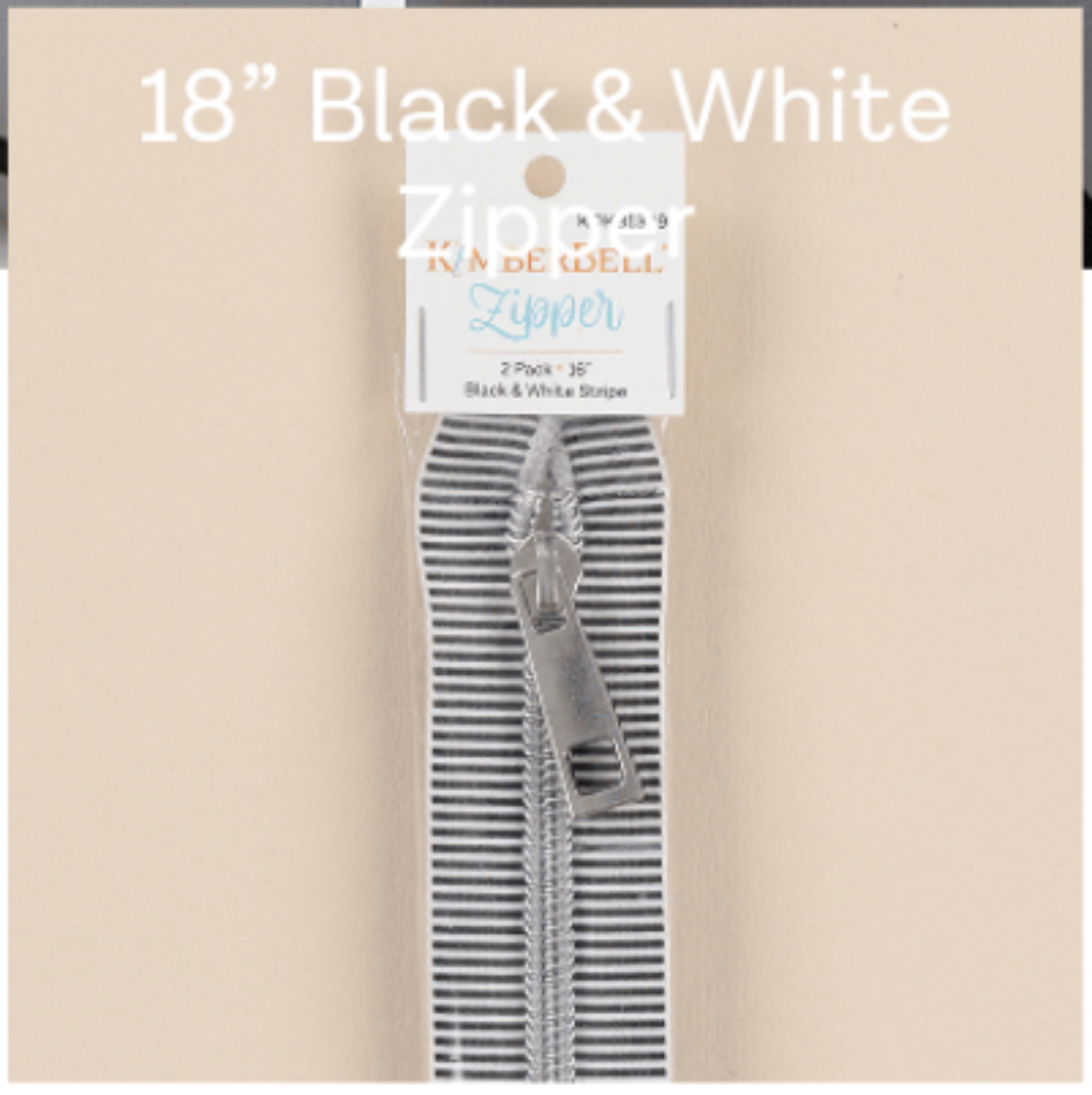 Packaged black and white zippers with a visible brand label on a beige background