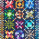 Colorful quilt with geometric patterns on a dark blue background