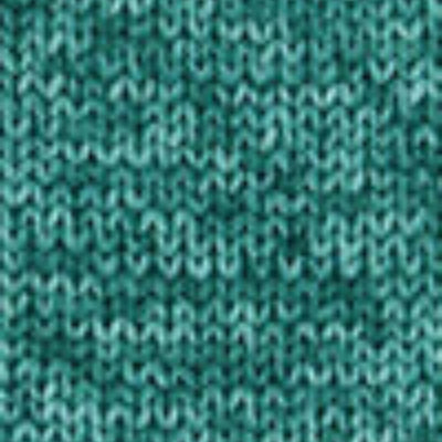 A close-up of a teal green knit fabric texture, showing the detailed knit pattern and color.