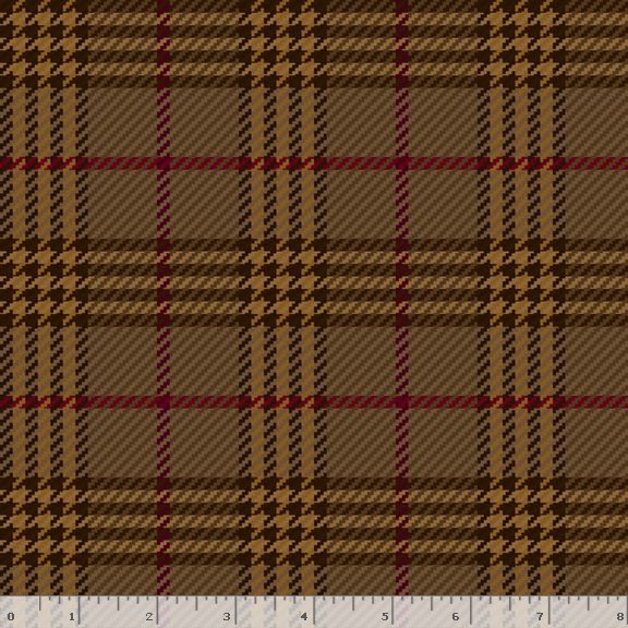 A close-up of a brown plaid fabric pattern with black and red stripes, featuring a white ruler scale at the bottom edge.