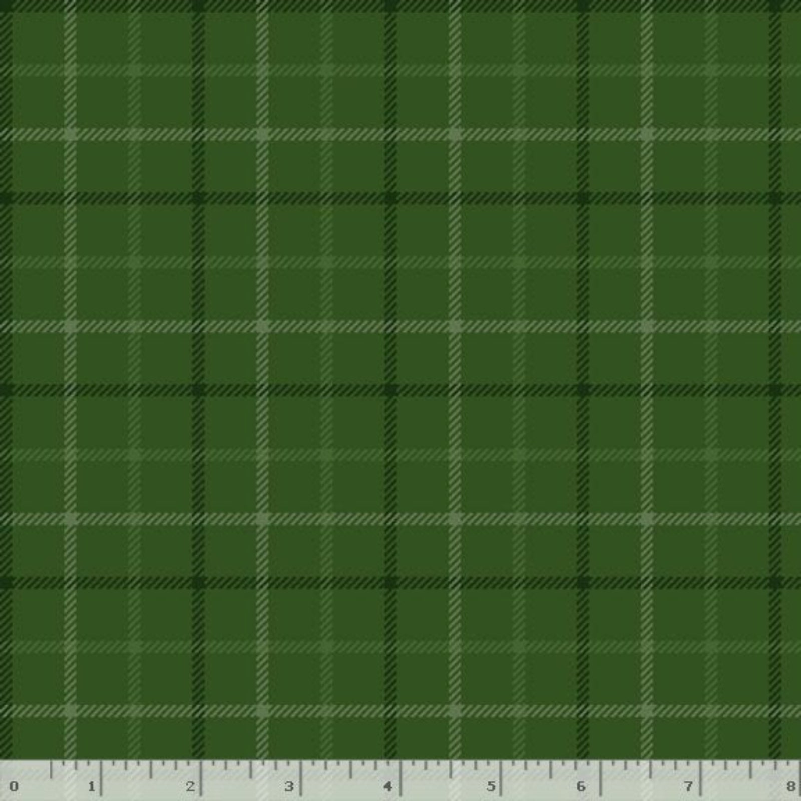 A close-up of a green plaid fabric pattern with intersecting dark and light stripes, shown flat with a ruler along the bottom edge for scale.