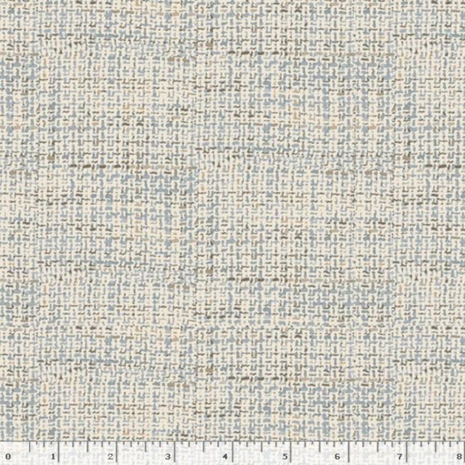 A close-up of a printed woven fabric texture with a small-scale geometric pattern in light beige, cream, and pale blue, with a white ruler at the bottom edge showing scale.