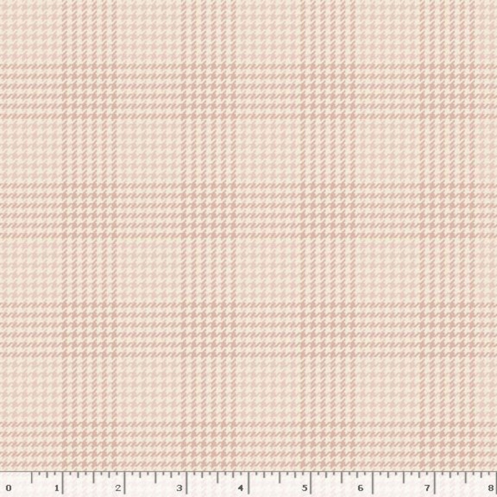A close-up of a fabric pattern showing a fine plaid and small houndstooth-like check in soft blush pink and warm beige, with a white ruler along the bottom edge for scale.