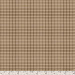 A close-up of a brown and beige houndstooth fabric pattern with a white ruler at the bottom edge showing scale.
