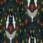 A repeating seamless pattern featuring stylized white owls, red star-shaped flowers, yellow crescent moons, and dark botanical silhouettes on a very dark navy background.