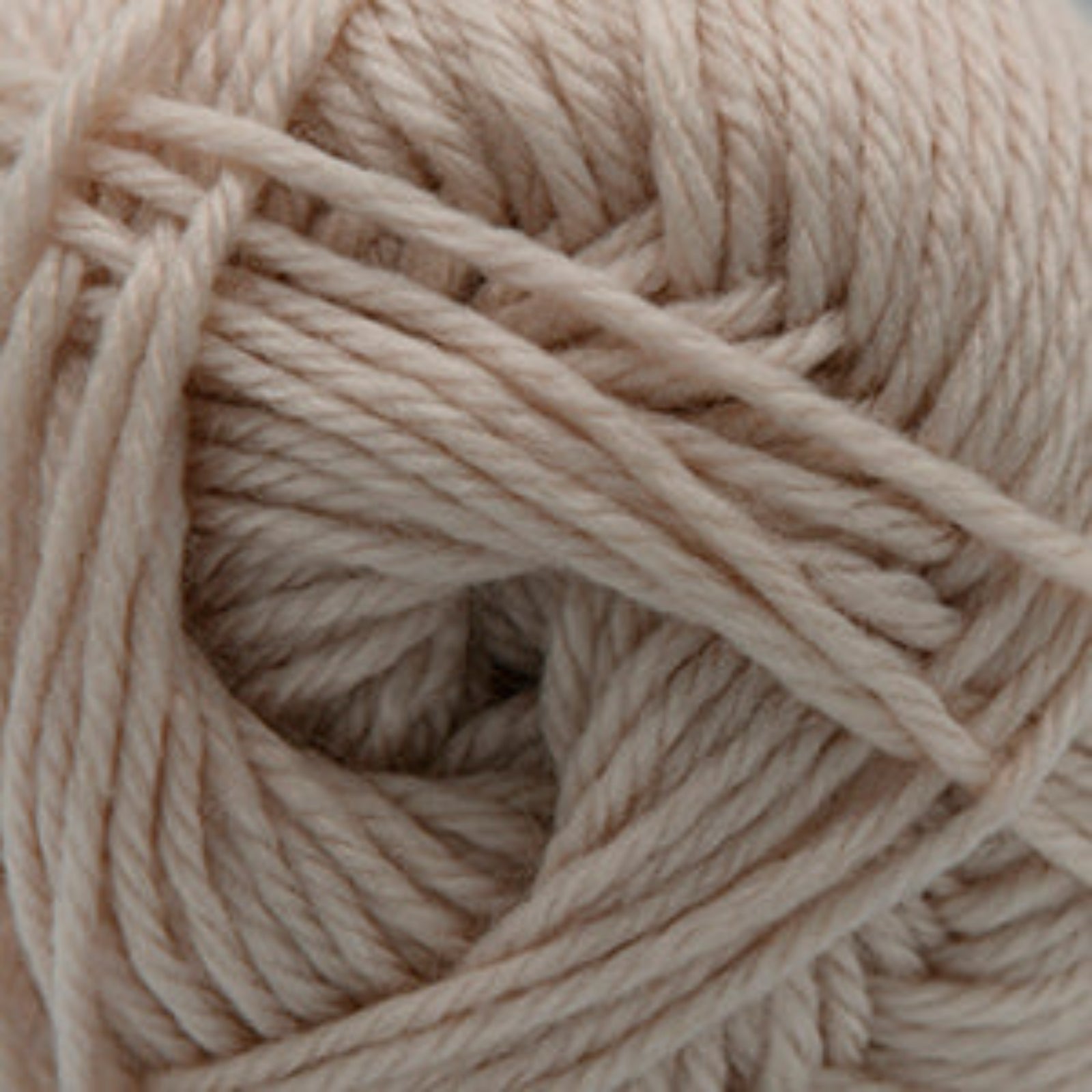 Close-up of a ball of beige yarn