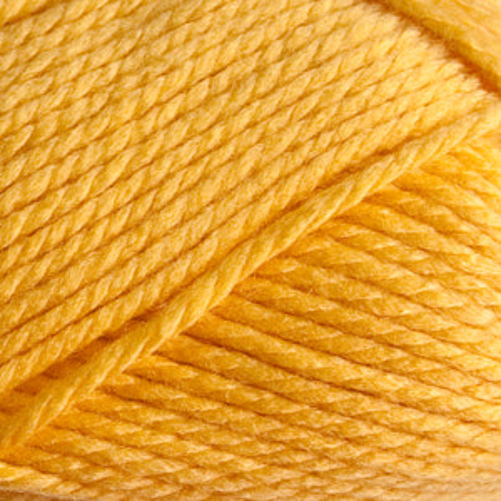 Close-up of a ball of yellow yarn