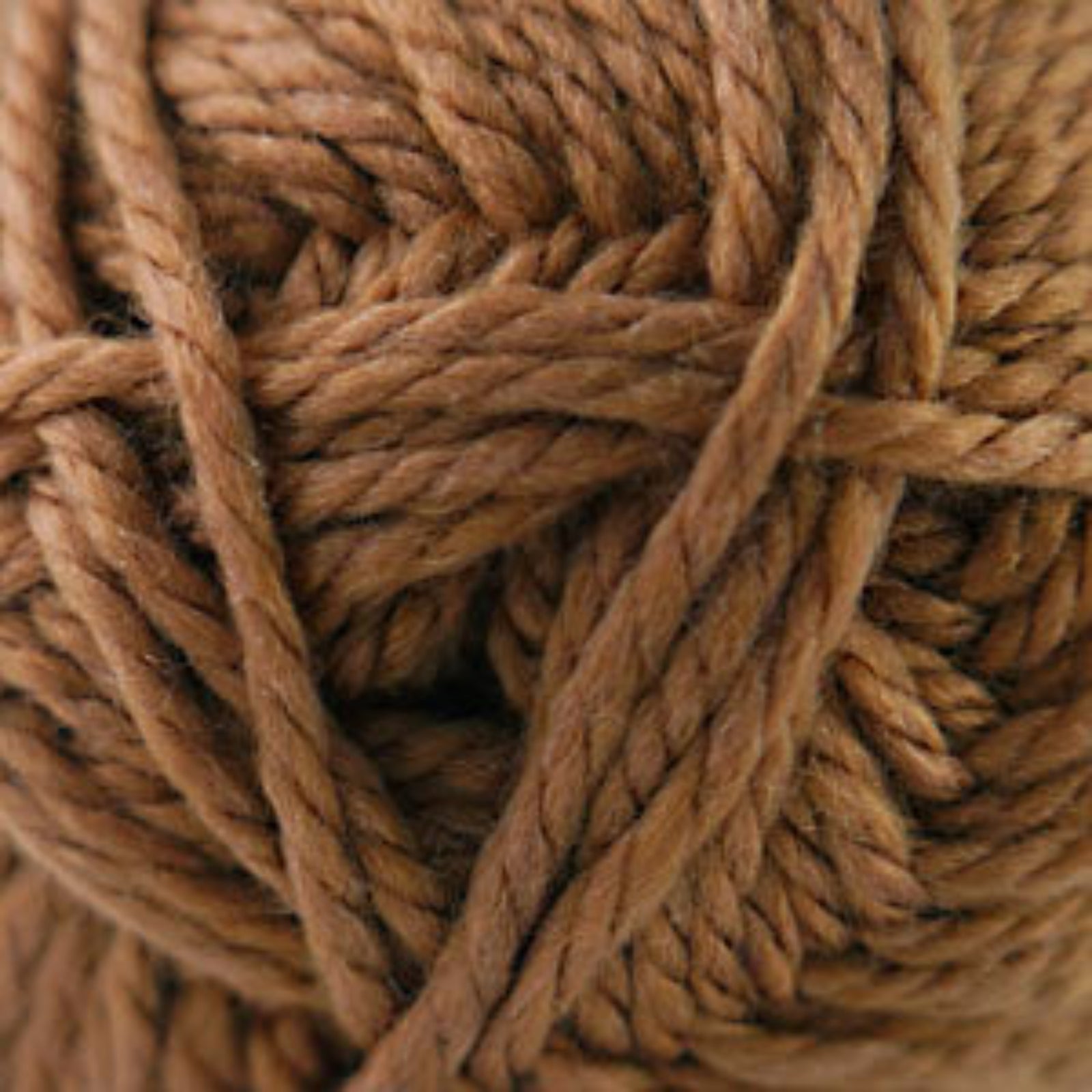 Close-up of a ball of brown yarn