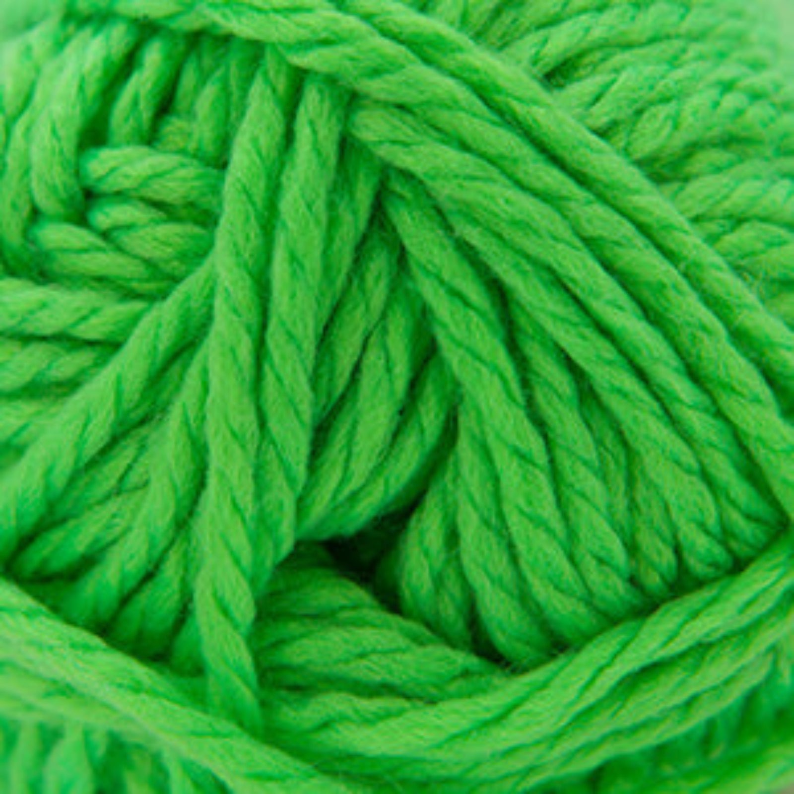 Bright neon green yarn wound into a skein, filling the entire frame.