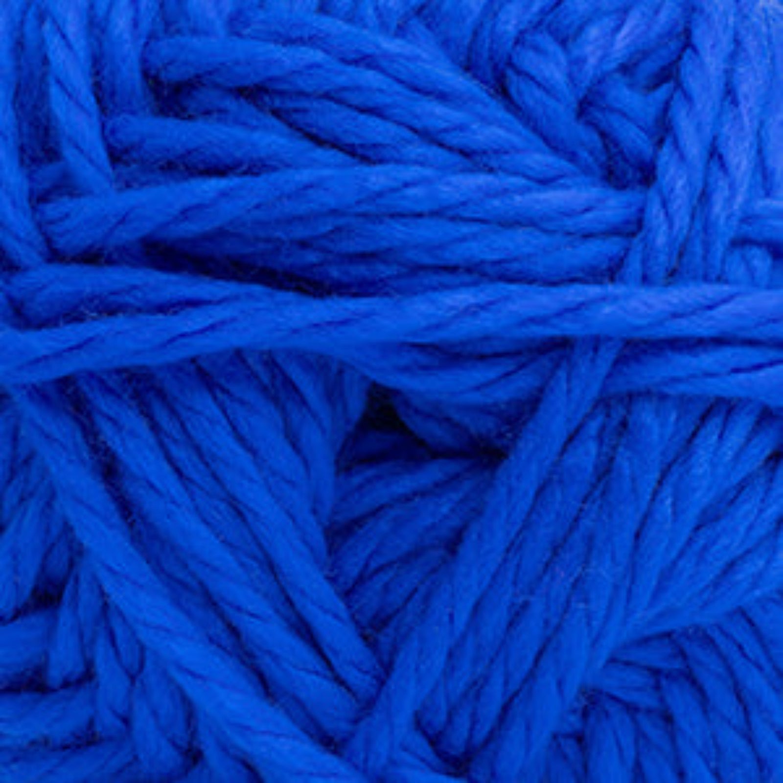 A close-up of bright royal blue yarn strands filling the frame, showing the fiber texture and twisted ply structure.