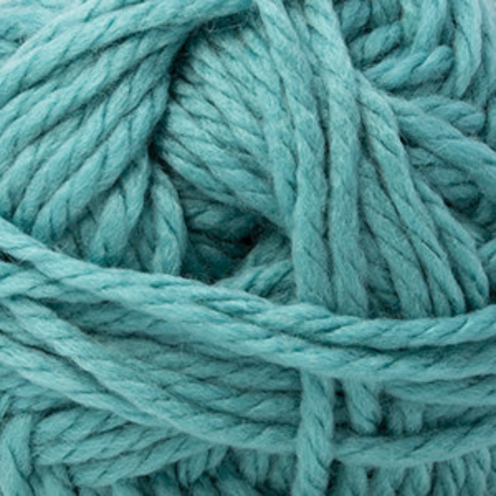 A close-up of a skein of thick, twisted yarn in a soft mint green or aqua shade, filling the entire frame.