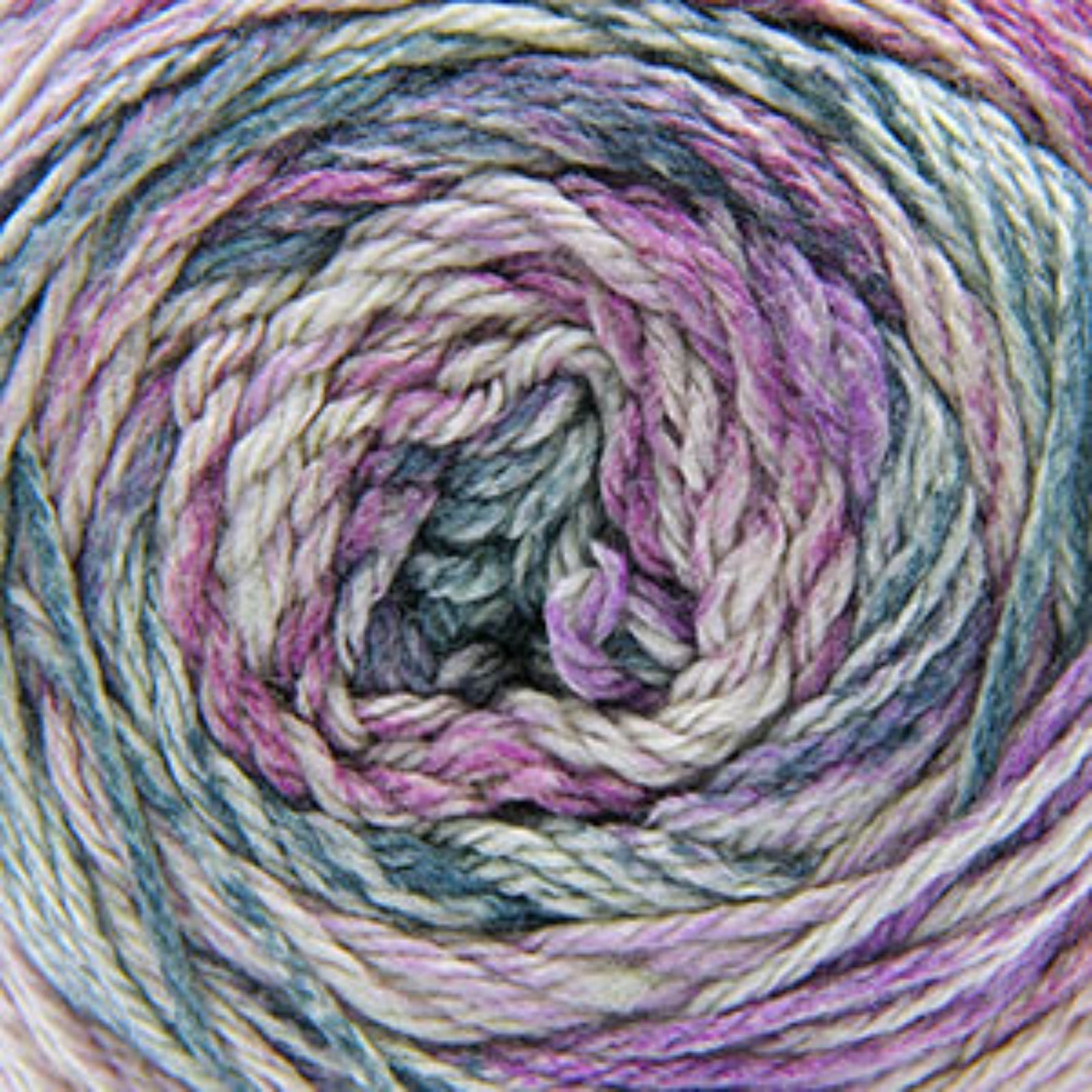 Close-up of a ball of multicolored yarn with shades of purple, blue, and green.