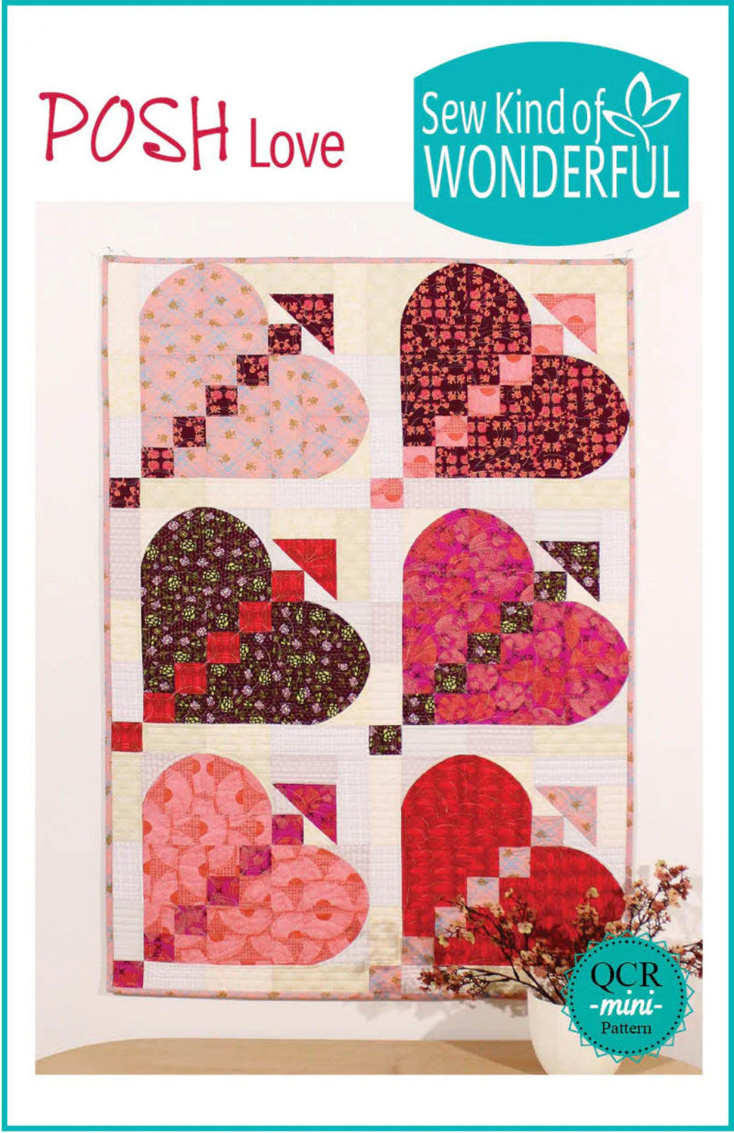 Quilt pattern with heart shapes featuring 'POSH Love' and 'Sew Kind of Wonderful' branding.