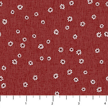 Red fabric with a white daisy pattern and a ruler scale at the bottom.