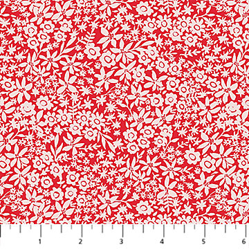 Red and white floral patterned fabric with a ruler scale visible along the bottom edge.