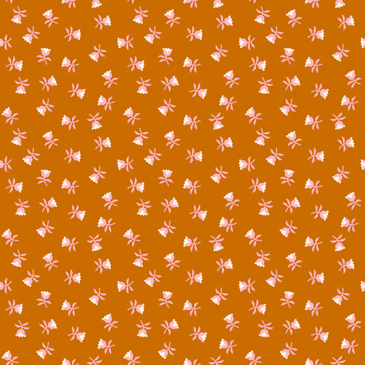 Pattern of small pink flowers on a brown background