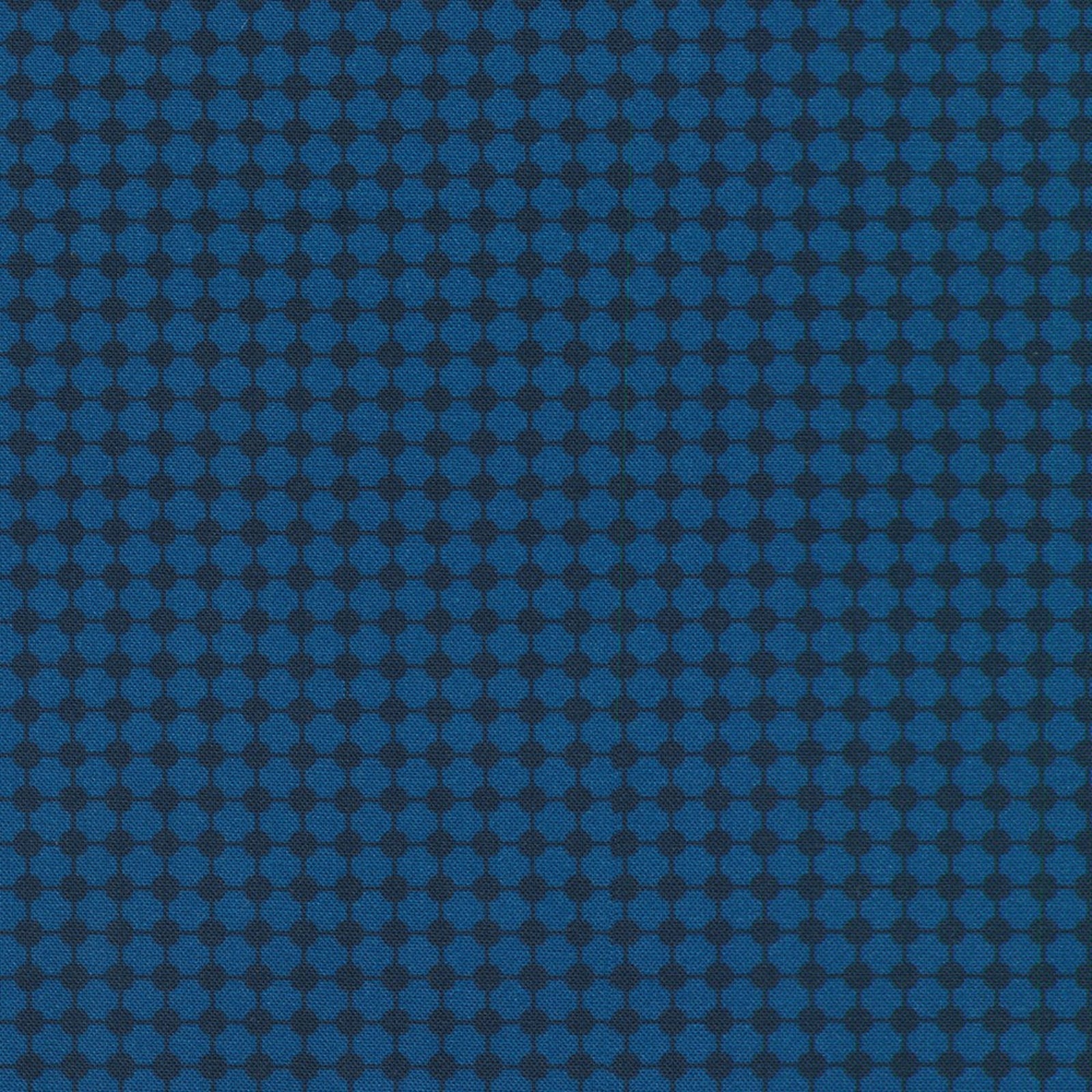 A close-up of a blue fabric or material swatch with a repeating hexagonal pattern.