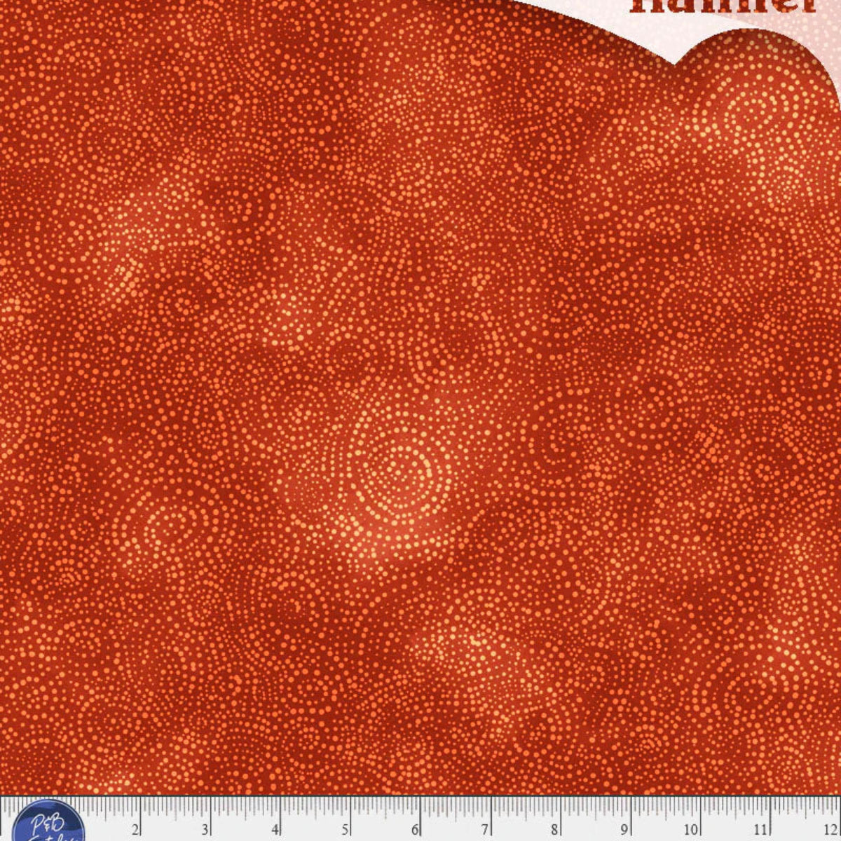 Orange flannel fabric with a ruler at the bottom for scale