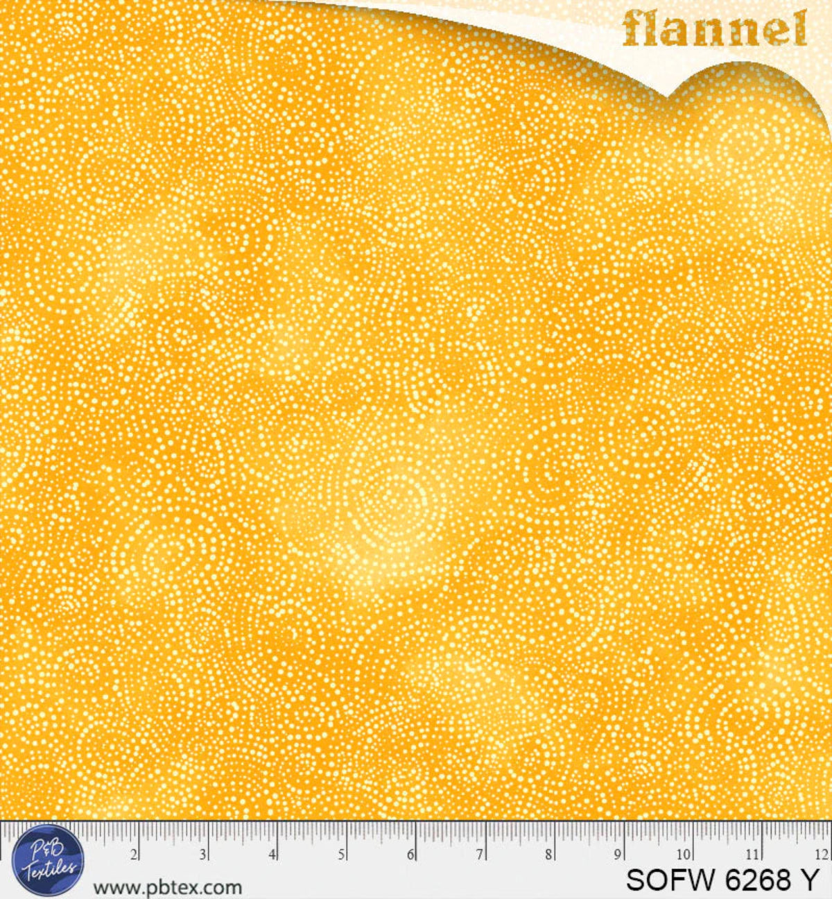 Yellow flannel fabric with a small white pattern and a ruler at the bottom for scale.