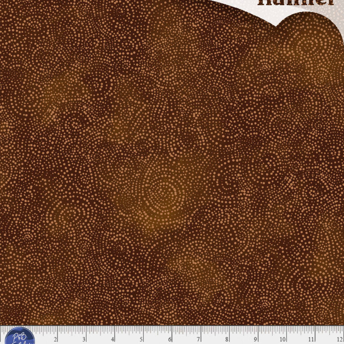 Brown flannel fabric with a subtle pattern and ruler at the bottom for scale.