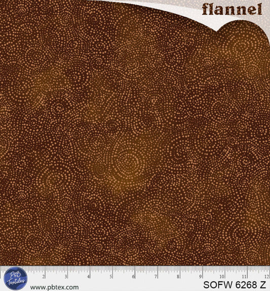 Brown flannel fabric with a subtle pattern and ruler at the bottom for scale.