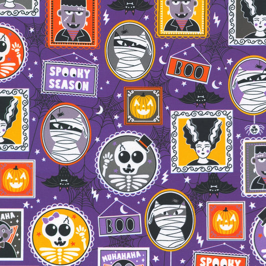 Halloween-themed fabric pattern with various spooky elements on a purple background.