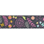 Decorative ribbon with colorful floral and leaf pattern on a dark background